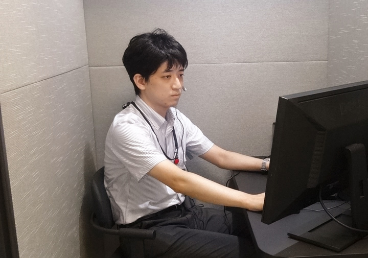 仕事中の社員PM Y.Sの写真